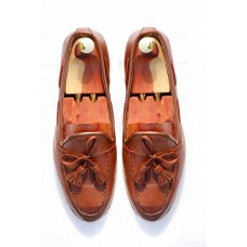 Brown leather loafer shoes with tassels and rubber sole